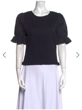 Reformation black smocked top